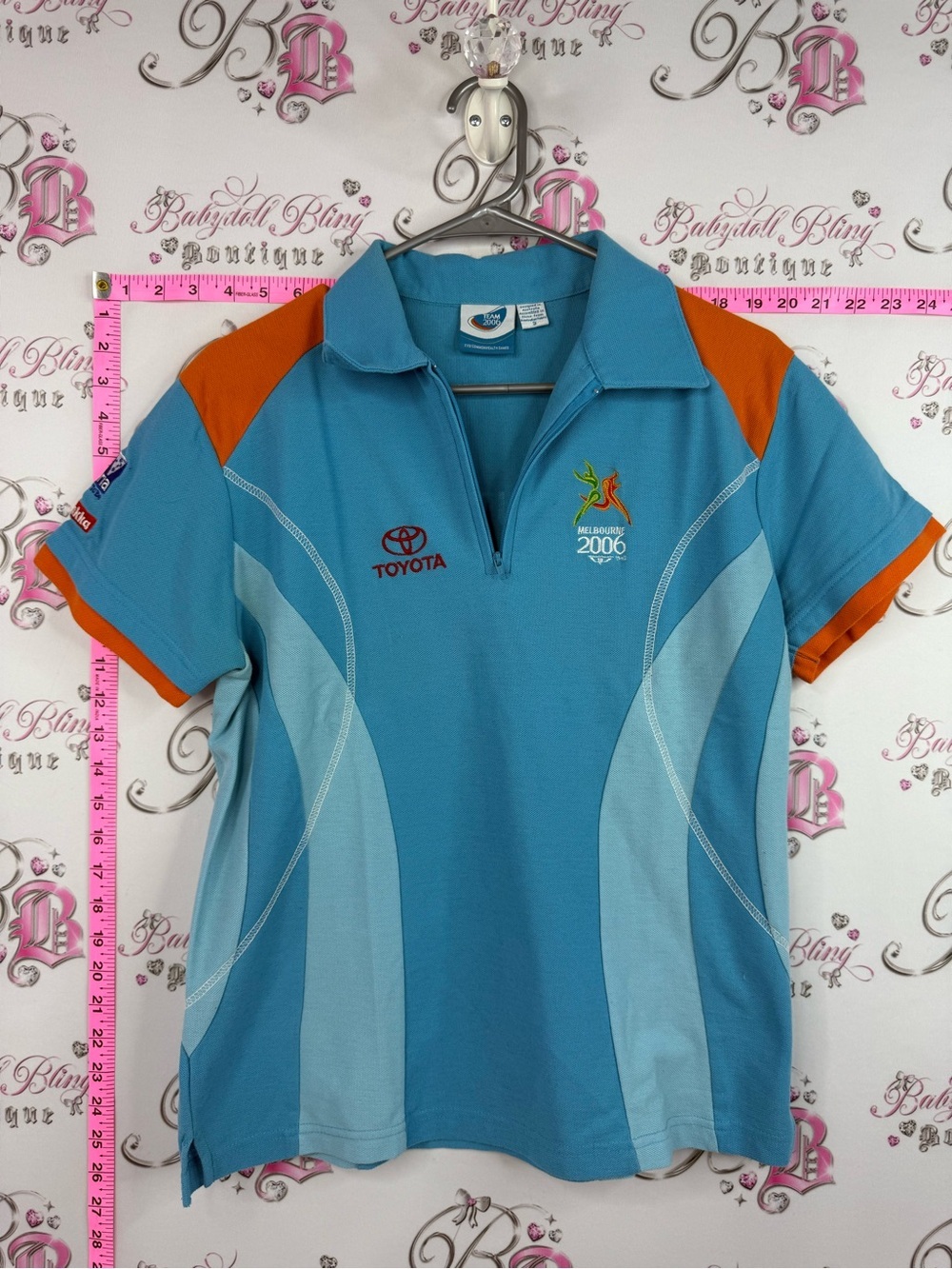 Team 2006 Melbourne 2006 Blue & Orange Polo Shirt